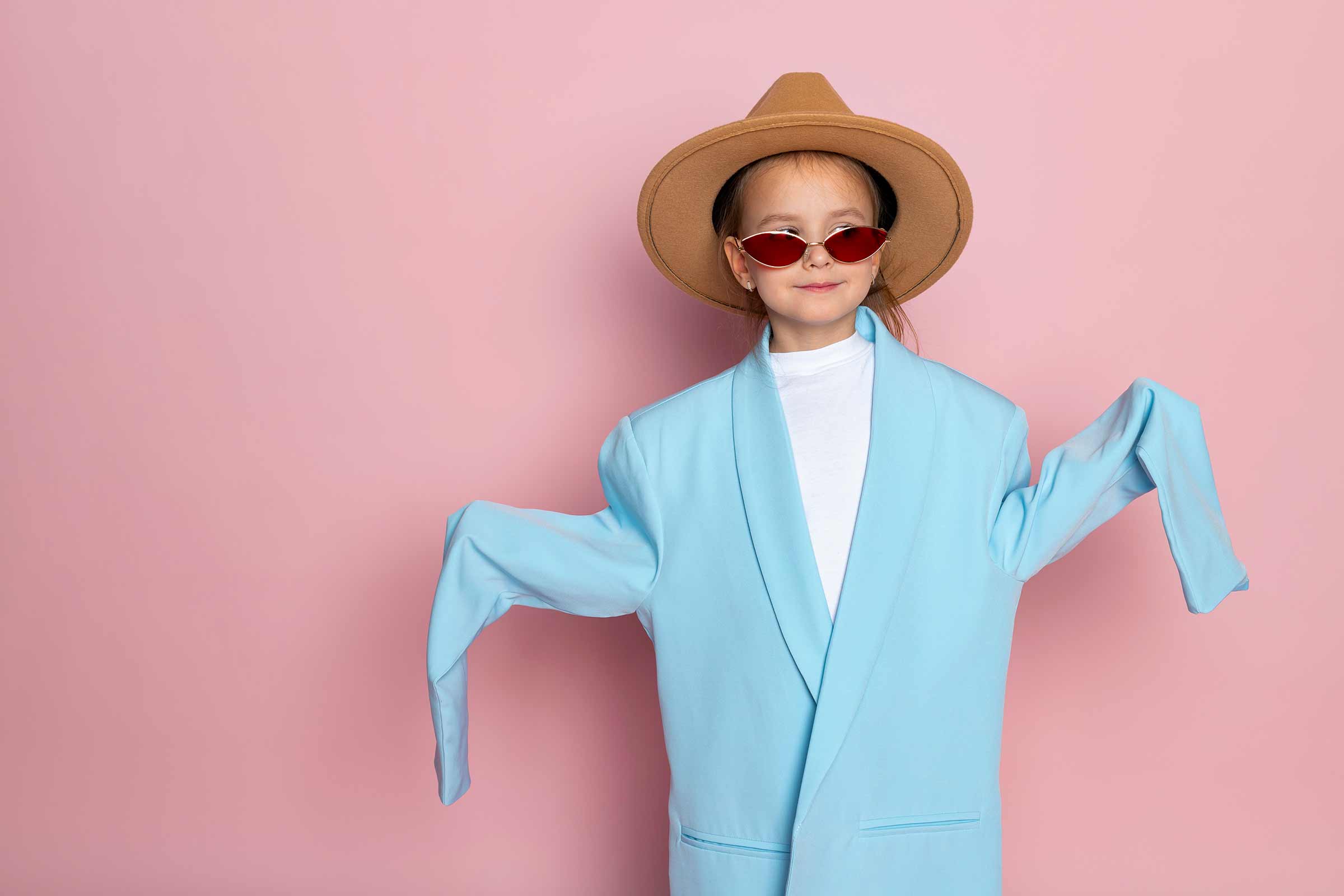 Little girl playing dress-up