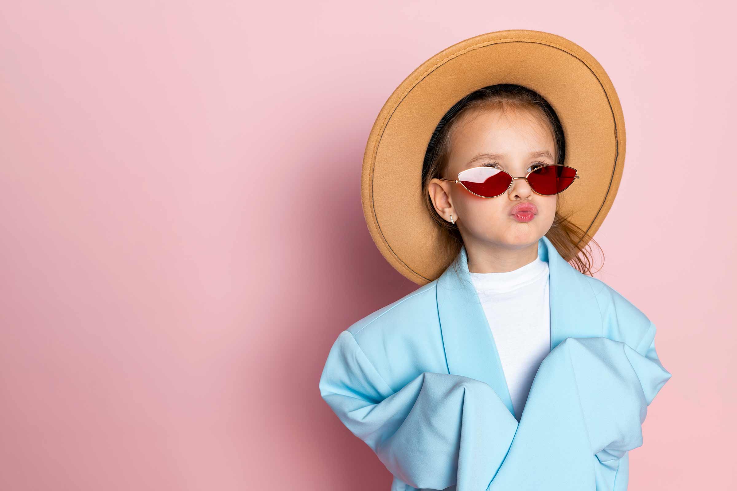 Little girl playing dress-up